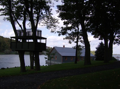 Custom built tree house and boathouse on the St. Lawrence river